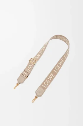 Anagram-stropper i jacquard og kalveskinn