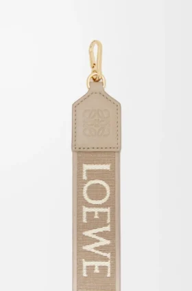 Anagram-stropper i jacquard og kalveskinn