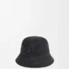 Bucket-hatt i raffia og kalveskinn