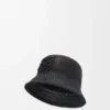 Bucket-hatt i raffia og kalveskinn
