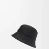 Bucket-hatt i raffia og kalveskinn