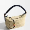 Cala Miniveske i klassisk kalveskinn og raffia Cala Miniveske i klassisk kalveskinn og raffia