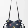 «Cats» medium Flamenco-clutch i brodert denim «Cats» medium Flamenco-clutch i brodert denim
