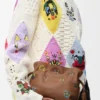 Cats Mini Flamenco-clutch i nappa-kalveskinn Cats Mini Flamenco-clutch i nappa-kalveskinn