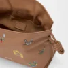 Cats Mini Flamenco-clutch i nappa-kalveskinn Cats Mini Flamenco-clutch i nappa-kalveskinn