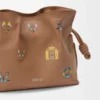 Cats Mini Flamenco-clutch i nappa-kalveskinn Cats Mini Flamenco-clutch i nappa-kalveskinn
