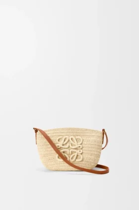 Eclipse Pochette i raffia og kalveskinn