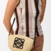 Eclipse Pochette i raffia og kalveskinn Eclipse Pochette i raffia og kalveskinn