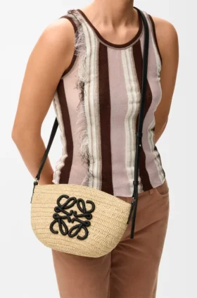 Eclipse Pochette i raffia og kalveskinn