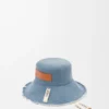 Fiskerhatt med frynser i denim og kalveskinn Fiskerhatt med frynser i denim og kalveskinn