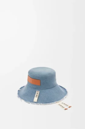 Fiskerhatt med frynser i denim og kalveskinn
