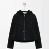 Jakke med hette i shearling Jakke med hette i shearling