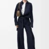 Jeans med belte i denim Jeans med belte i denim