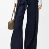 Jeans med belte i denim Jeans med belte i denim