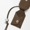 Liten, fjærlett Puzzle-veske i kornet nubuck