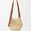 Liten «Punch Hole Hobo»-veske i raffia og kalveskinn Liten «Punch Hole Hobo»-veske i raffia og kalveskinn