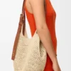 Liten «Punch Hole Hobo»-veske i raffia og kalveskinn Liten «Punch Hole Hobo»-veske i raffia og kalveskinn