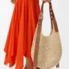 Liten «Punch Hole Hobo»-veske i raffia og kalveskinn Liten «Punch Hole Hobo»-veske i raffia og kalveskinn