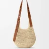 Liten «Punch Hole Hobo»-veske i raffia og kalveskinn Liten «Punch Hole Hobo»-veske i raffia og kalveskinn