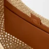 Liten «Punch Hole Hobo»-veske i raffia og kalveskinn Liten «Punch Hole Hobo»-veske i raffia og kalveskinn