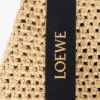 Liten «Punch Hole Hobo»-veske i raffia og kalveskinn Liten «Punch Hole Hobo»-veske i raffia og kalveskinn