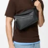Liten Puzzle Bumbag i kornet kalveskinn Liten Puzzle Bumbag i kornet kalveskinn