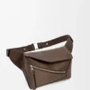 Liten Puzzle Bumbag i kornet kalveskinn Liten Puzzle Bumbag i kornet kalveskinn