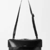 Liten Switch-tote-veske i papirkalveskinn og semsket skinn Liten Switch-tote-veske i papirkalveskinn og semsket skinn