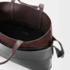 Liten Switch-tote-veske i papirkalveskinn og semsket skinn Liten Switch-tote-veske i papirkalveskinn og semsket skinn