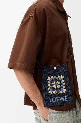 Lomme med snøring i klassisk kalveskinn og raffia