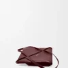 Mellomstor Puzzle Fold-tote-veske i skinnende kalveskinn