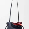 Mini-lagdelt Flamenco-clutch i nappa-kalveskinn