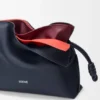 Mini-lagdelt Flamenco-clutch i nappa-kalveskinn