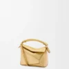 Mini Puzzle Edge-veske i laminert lammeskinn Mini Puzzle Edge-veske i laminert lammeskinn