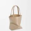 Mini Puzzle Fold-tote i skinnende kalveskinn Mini Puzzle Fold-tote i skinnende kalveskinn