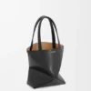 Mini Puzzle Fold-tote i skinnende kalveskinn Mini Puzzle Fold-tote i skinnende kalveskinn