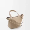 Mini Puzzle Fold-tote i skinnende kalveskinn Mini Puzzle Fold-tote i skinnende kalveskinn