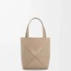 Mini Puzzle Fold-tote i skinnende kalveskinn Mini Puzzle Fold-tote i skinnende kalveskinn