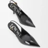 Nye Comic-pumps med slingback i blandet skinn