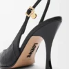 Nye Comic-pumps med slingback i blandet skinn