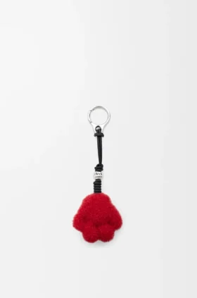 Pote-smykke i shearling og kalveskinn