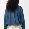 Skjorte med belte i denim Skjorte med belte i denim