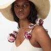 Solhatt i raffia og kalveskinn Solhatt i raffia og kalveskinn