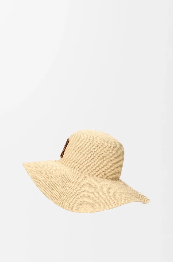 Solhatt i raffia og kalveskinn Solhatt i raffia og kalveskinn
