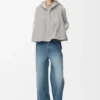 Vest med hette i shearling Vest med hette i shearling