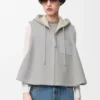 Vest med hette i shearling Vest med hette i shearling